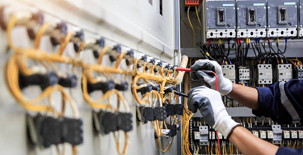 Professional Electrician technician working in June Park, FL
